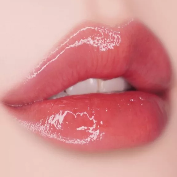 UNLEASHIA Popcorn Syrup Lip Plumper Nr. 1 Strawberry Cream 